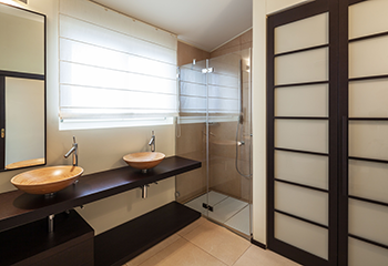 Burbank master bathroom with light Roman shades