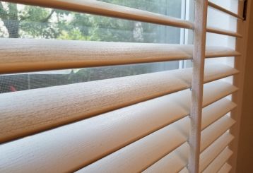 Faux wood blinds installation in Glendale home