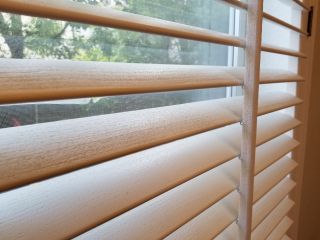 Faux wood blinds installation in Glendale home