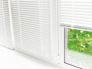 Mini Blinds | Glendale Blinds & Shades CA Close-up of one-inch aluminum mini blinds showcasing durability and timeless design.